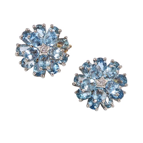 Pair of aquamarine and diamond flowerhead cluster earrings by Tiffany, New York, of circular outline,